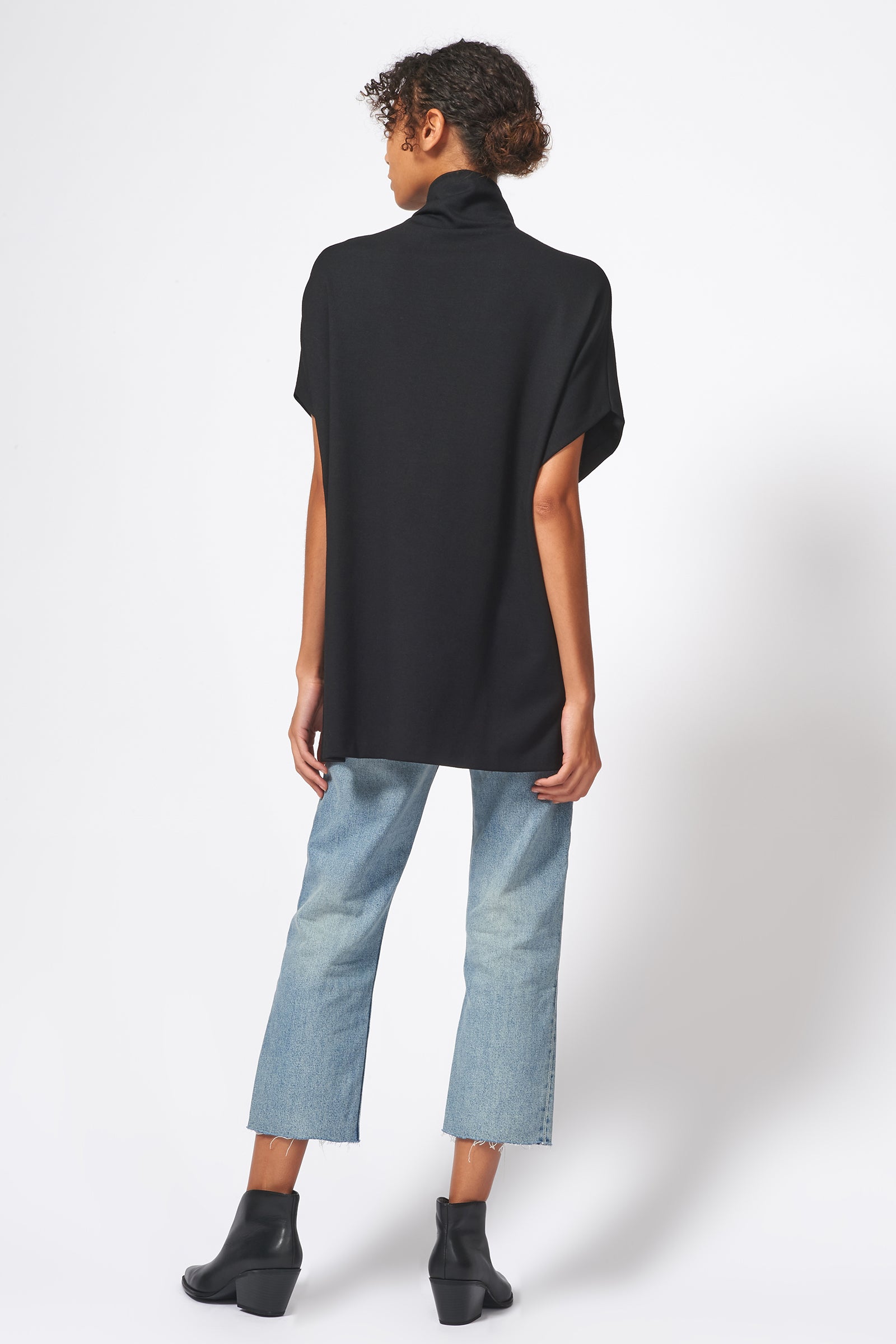 Kal Rieman Ponte Funnelneck in Black on Model Full Back View with Cropped Jeans