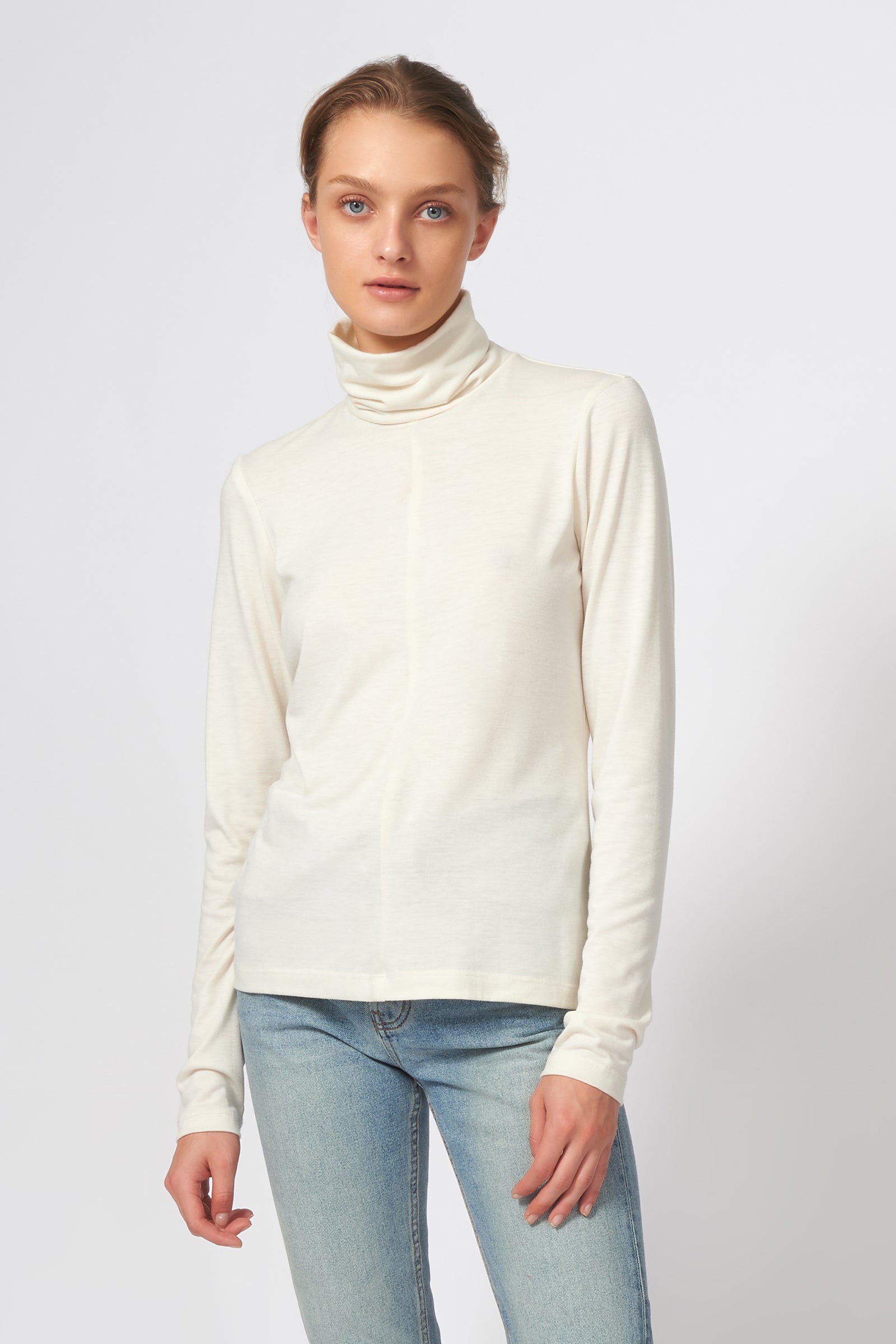 Kal Rieman Seamed Turtleneck in Ivory on Model Front View
