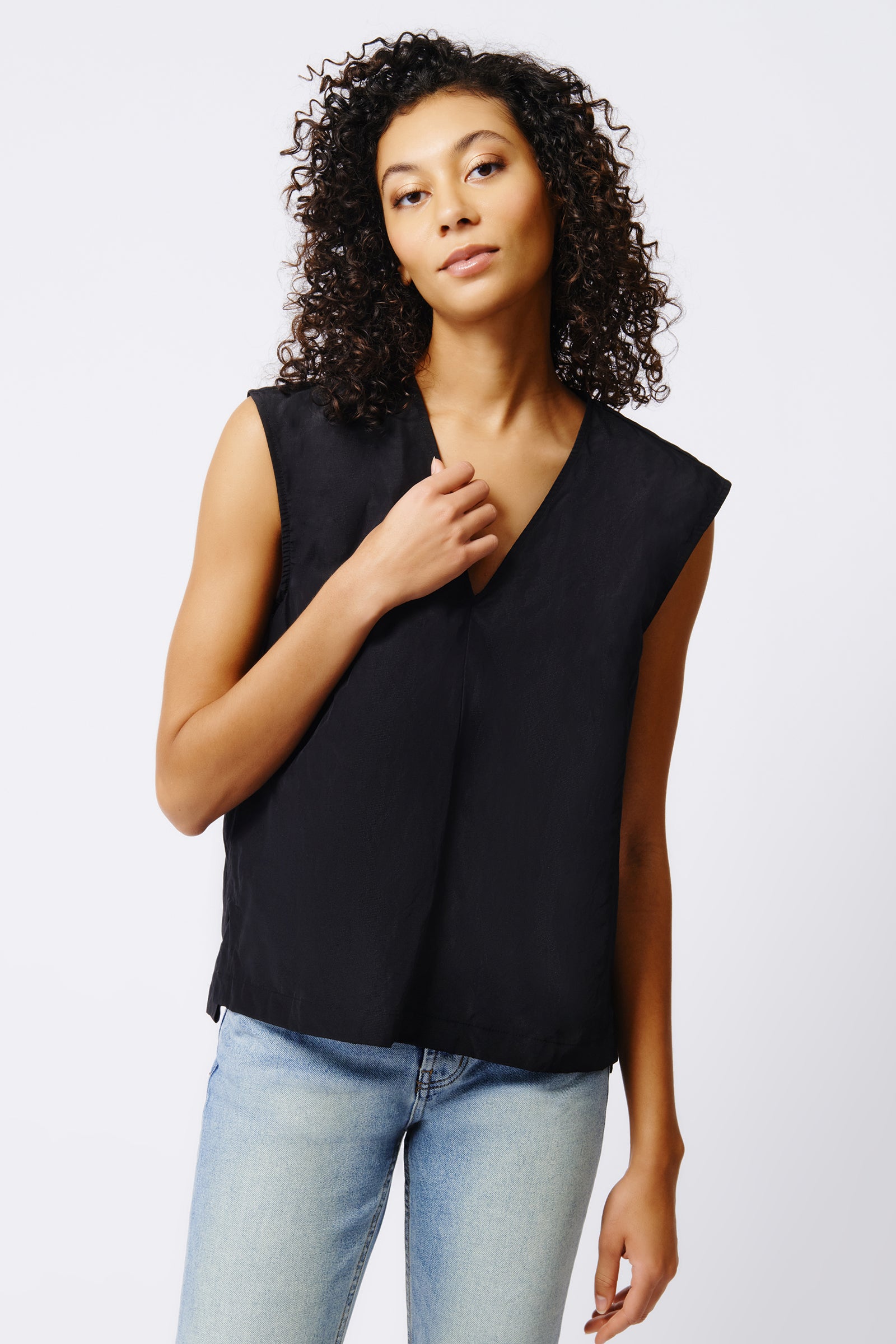 Kal Rieman Ava V Neck Shell in Black on Model Front View Crop 4